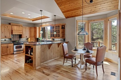 Located on the golf course, with mountain views, this NW lodge - photo 10