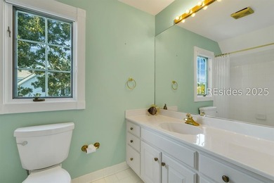 This exceptional Lowcountry home in Windmill Harbour offers an