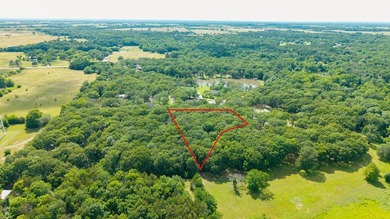 Beautiful 1.2-acre wooded homesite featuring mature oak trees - photo 22