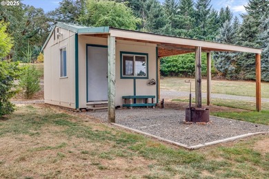 Nestled on nearly 3 acres, this welcoming ranch home has 3 - photo 32