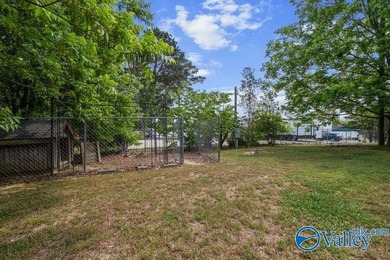 Positioned on a gentle knoll across from Weiss Lake, this - photo 35