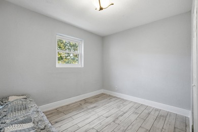 This beautifully renovated 3-bedroom concrete block home tucked - photo 5