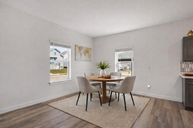Sunlit, zero-entry living paired with a welcoming front porch - photo 9