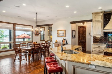 Exceptional lakefront living begins with a striking stone - photo 7