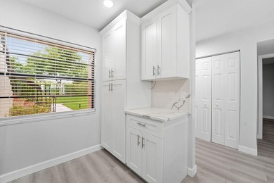 FULLY RENOVATED, 1st-FLOOR, LAKE FRONT condo located in the - photo 6