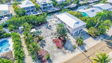 Oceanside canal-front home in the desirable Breezeswept Beach - photo 1