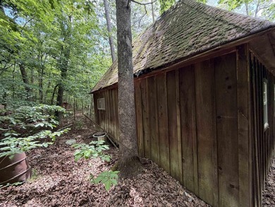 Escape to a truly remote lakeside hideaway spanning 5 acres and - photo 9