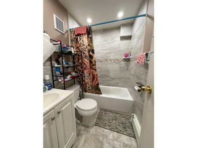 Welcome to this Semi Attached two-family home located on the - photo 20
