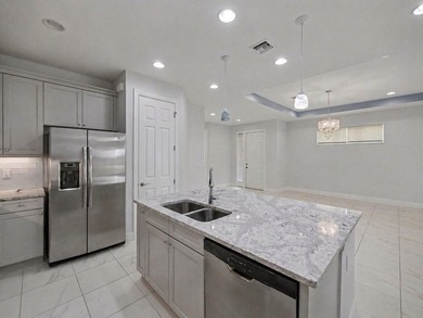 Welcome to this beautifully maintained 2-bedroom + den, 2-bath - photo 3