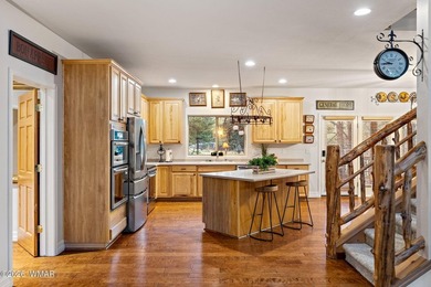 Experience mountain luxury and serene golf course living in this - photo 11