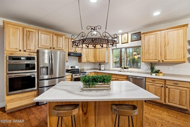 Experience mountain luxury and serene golf course living in this - photo 12