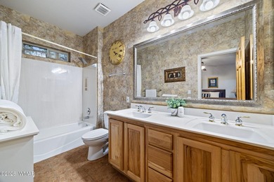 Experience mountain luxury and serene golf course living in this - photo 23