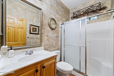 Experience mountain luxury and serene golf course living in this - photo 25