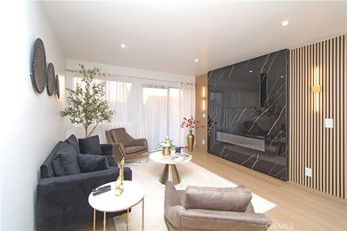 Welcome to Unit 19 at Plaza Pacifica, a beautifully renovated - photo 2