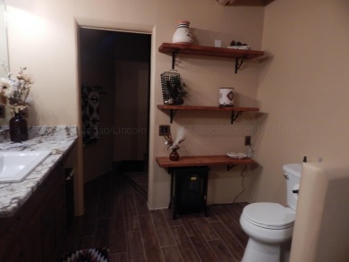 True Adobe style home in prestigious Alto Lakes Golf and Country