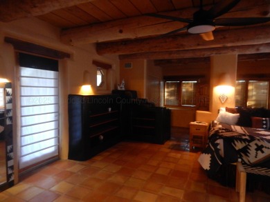 True Adobe style home in prestigious Alto Lakes Golf and Country