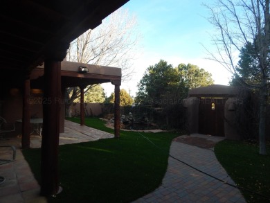 True Adobe style home in prestigious Alto Lakes Golf and Country