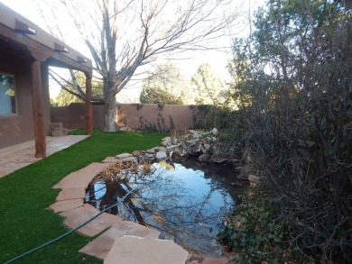 True Adobe style home in prestigious Alto Lakes Golf and Country