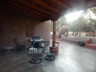 True Adobe style home in prestigious Alto Lakes Golf and Country