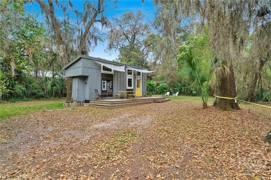This beautifully restored Lowcountry bungalow blends modern - photo 36