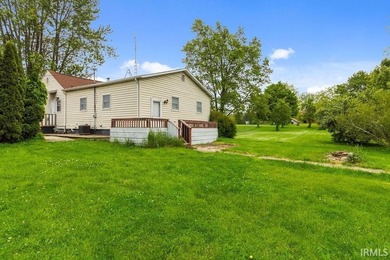 Situated on 1.28 acres in a country setting, this 3-bedroom - photo 4