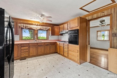 Situated on 1.28 acres in a country setting, this 3-bedroom - photo 6