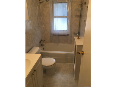 Spacious two-story detached legal 2 family home on a corner lot - photo 12