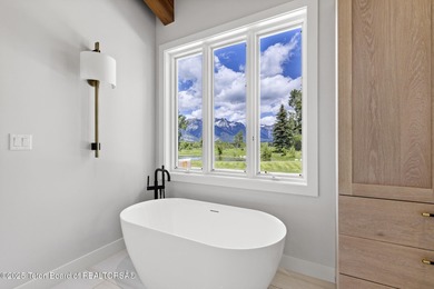 Situated on over 4 acres in the coveted Teton Cascades - photo 31
