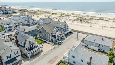 Enjoy the ultimate coastal lifestyle in this exceptional - photo 1