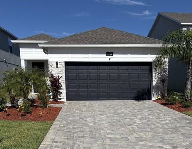 Newly Built in 2023, 3/2/2 Lake Front Home with many upgrades - photo 1