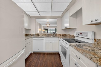 First Floor updated 2 bedroom 2 bathroom unit with a great golf - photo 2
