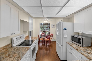 First Floor updated 2 bedroom 2 bathroom unit with a great golf - photo 3