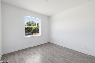 Located in the growing community of Rotonda Lakes, this - photo 3