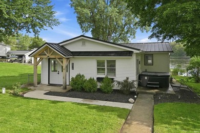 Welcome to Webster Lake! This beautifully updated 3-bedroom - photo 1
