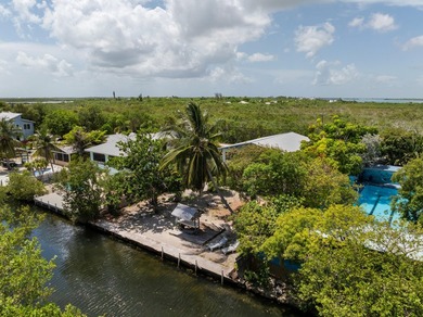 Are you looking for a canal-front home that could use your TLC? - photo 1