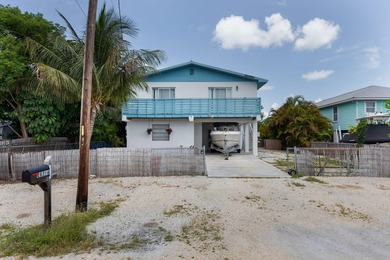 Are you looking for a canal-front home that could use your TLC? - photo 2