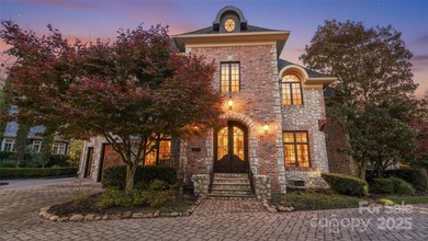 Enjoy luxurious gated living in this European inspired enclave
