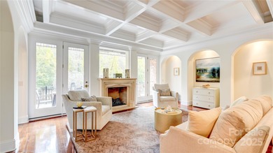 Enjoy luxurious gated living in this European inspired enclave