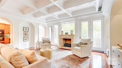 Enjoy luxurious gated living in this European inspired enclave