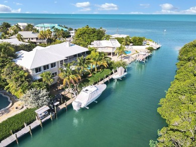Experience modern coastal luxury in Islamorada, where elevated - photo 1
