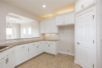 Live just steps from the beach, surf, and sunshine in this - photo 11