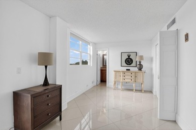 Pristine and fully updated, this penthouse-level 1-bedroom plus - photo 11