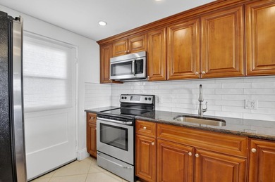 Pristine and fully updated, this penthouse-level 1-bedroom plus - photo 18