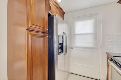 Pristine and fully updated, this penthouse-level 1-bedroom plus - photo 21