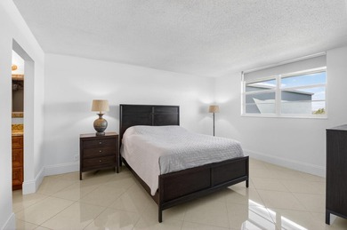 Pristine and fully updated, this penthouse-level 1-bedroom plus - photo 22