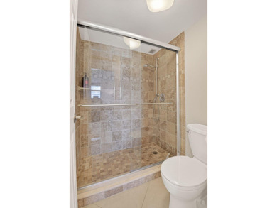Pristine and fully updated, this penthouse-level 1-bedroom plus - photo 26