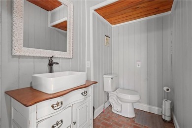 This Baxley property opens the door to something you don't come - photo 32