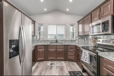 Ideally located along the perimeter wall near the front gate &amp;