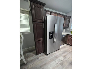 Ideally located along the perimeter wall near the front gate &amp;