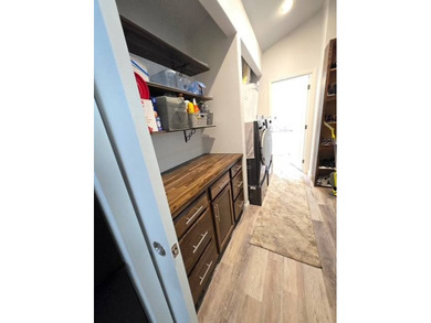 Ideally located along the perimeter wall near the front gate &